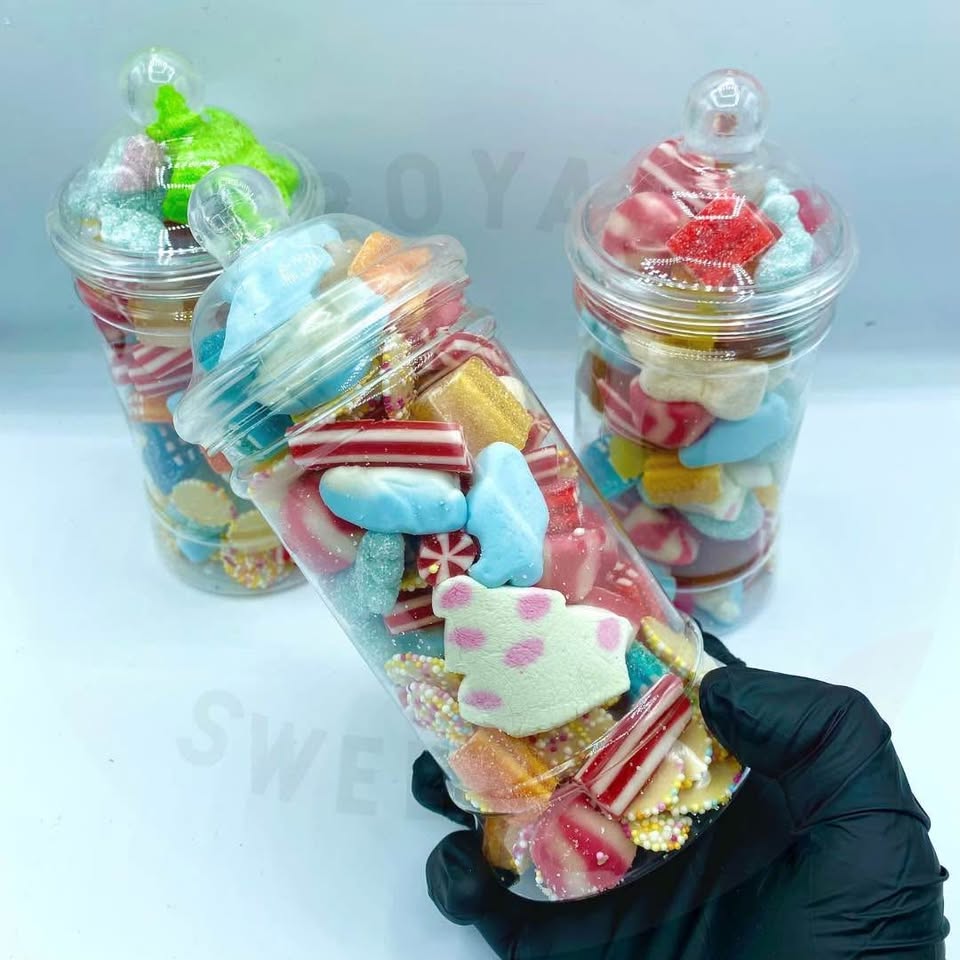 Colourful Christmas Pick N Mix sweets in a jar, featuring a variety of candies perfect for gifting, holiday parties, and festive celebrations.